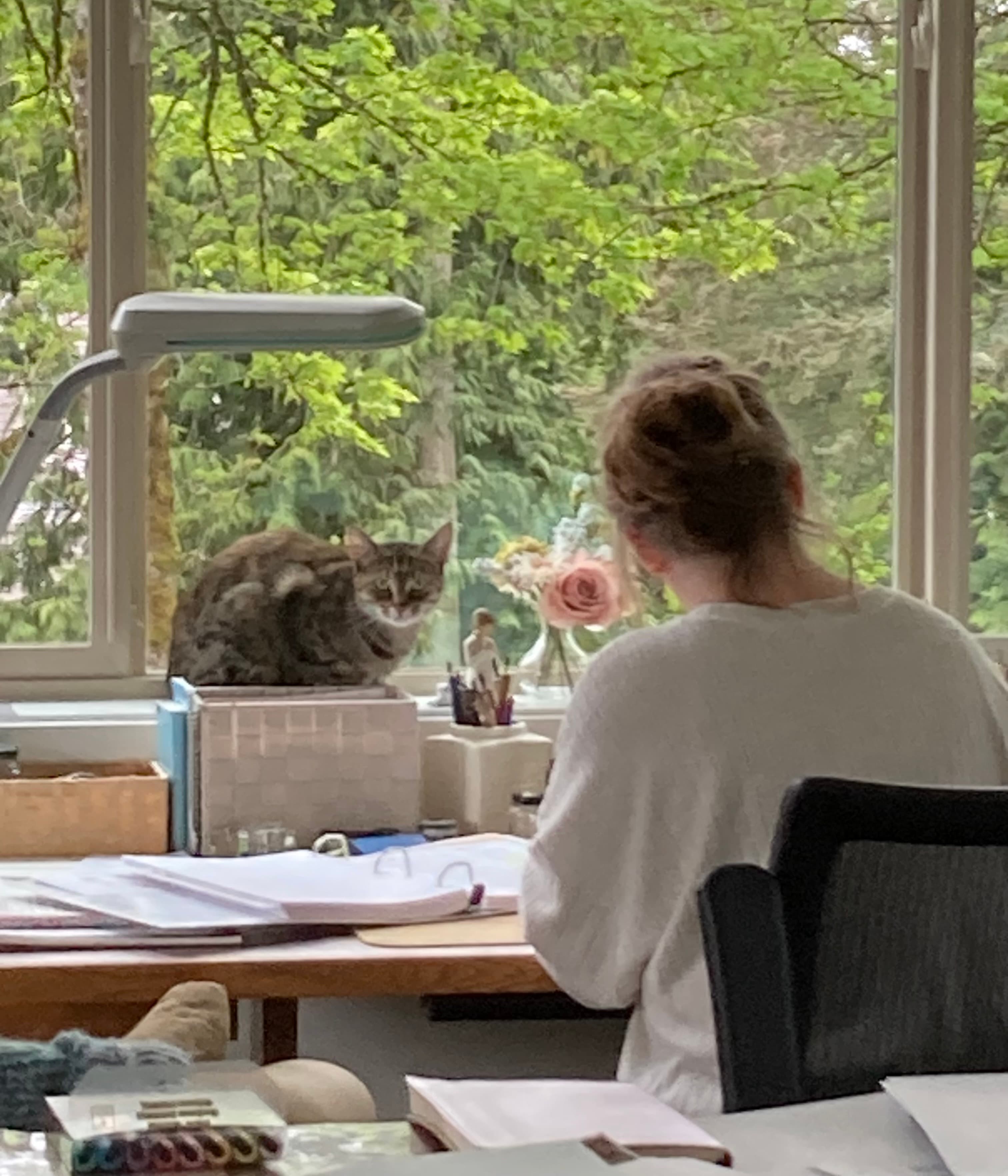 An assortment of wedding stationery on a wooden coin